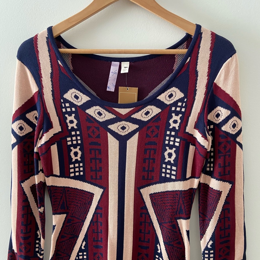 Knit form fitting patterned dress